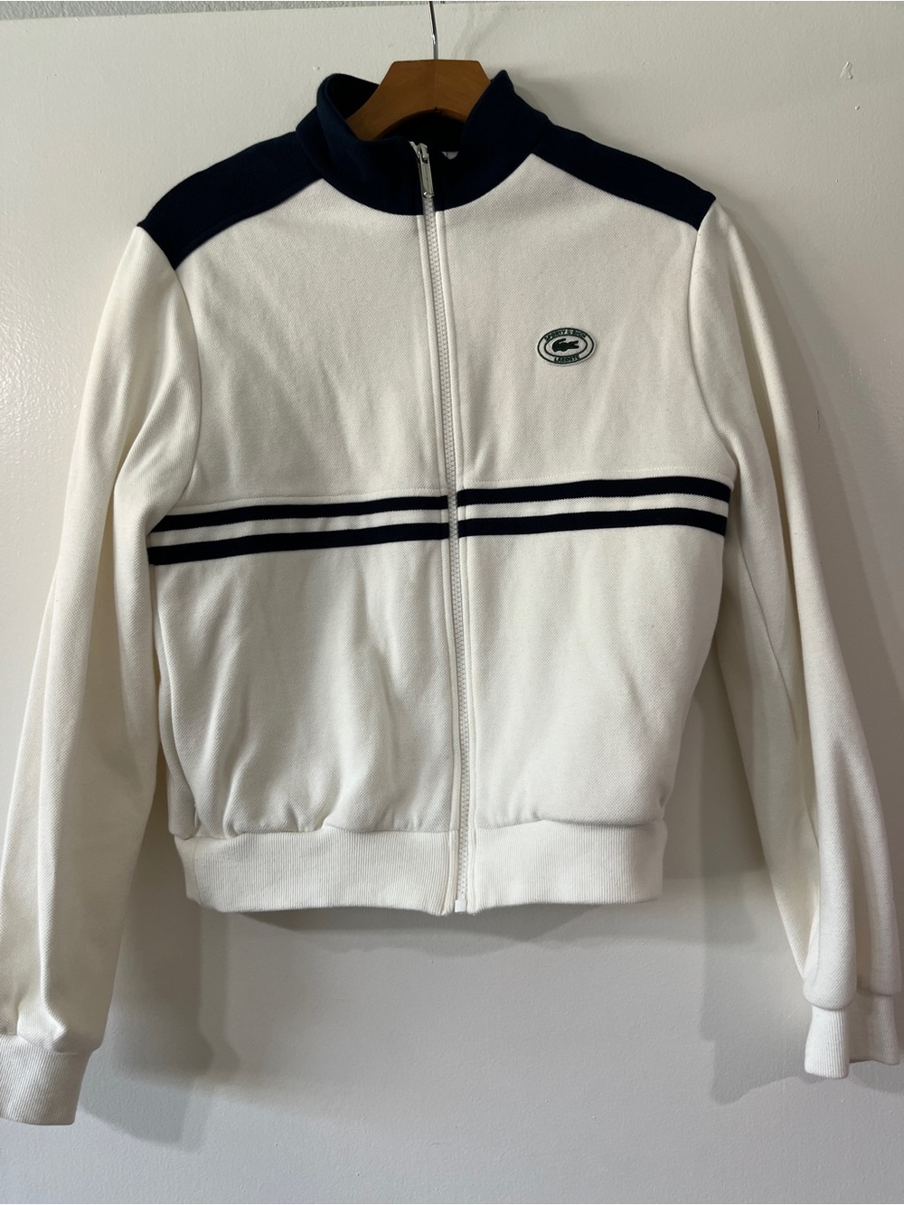 Lacoste White Track Jacket with Navy Shoulder and Stripe Accents